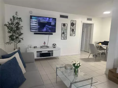 Living - 1335 W 68th St #308, Hialeah, FL 33014 photo 2 of 2