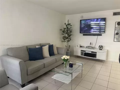 Living - 1335 W 68th St #308, Hialeah, FL 33014 photo 1 of 2