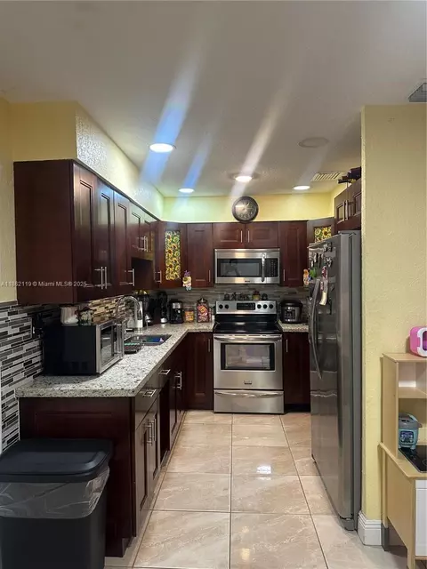 Kitchen - 719 Harem Ave, Opa Locka, FL 33054 photo 1 of 1