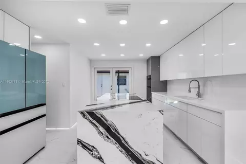 Kitchen - 770 SE 5th Pl, Hialeah, FL 33010 photo 3 of 5