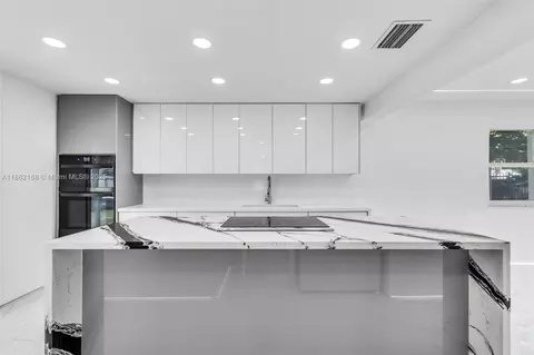 Kitchen - 770 SE 5th Pl, Hialeah, FL 33010 photo 4 of 5