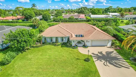 524 Muirfield Dr, Atlantis, FL 33462