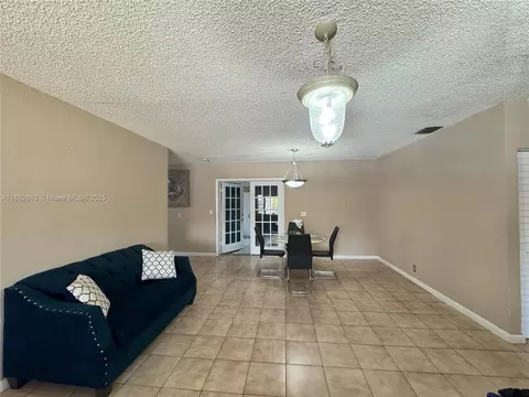 Living - 275 E 34th St, Hialeah, FL 33013 photo 1 of 4