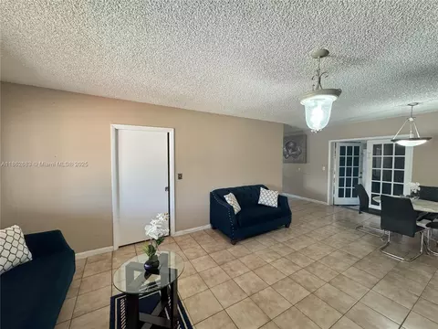 Living - 275 E 34th St, Hialeah, FL 33013 photo 2 of 4