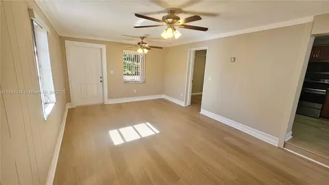 Living - 453 E 61st St, Hialeah, FL 33013 photo 3 of 4