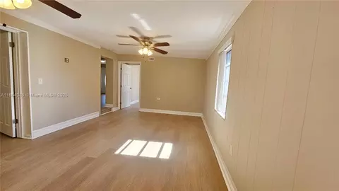 Living - 453 E 61st St, Hialeah, FL 33013 photo 4 of 4