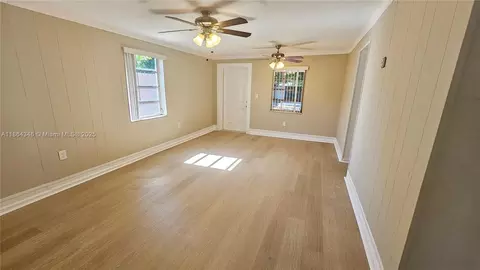 Living - 453 E 61st St, Hialeah, FL 33013 photo 2 of 4