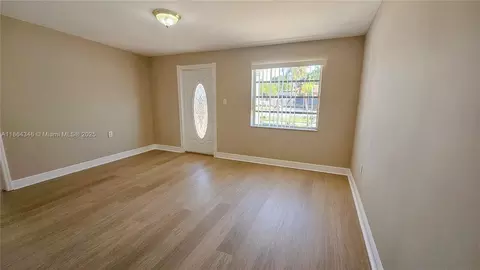 Living - 453 E 61st St, Hialeah, FL 33013 photo 1 of 4