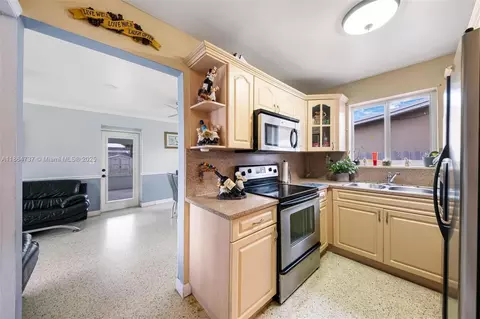 Kitchen - 897 W 36th St, Hialeah, FL 33012 photo 2 of 2