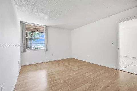 Living - 1900 W 68th St #C203, Hialeah, FL 33014 photo 2 of 2