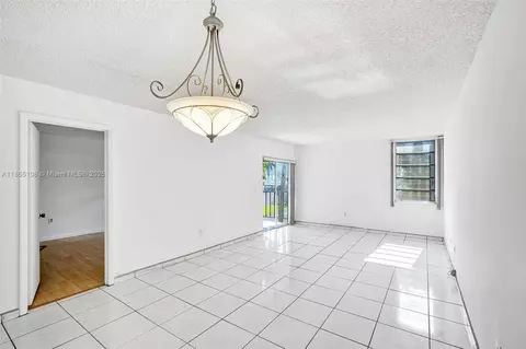 Living - 1900 W 68th St #C203, Hialeah, FL 33014 photo 1 of 2