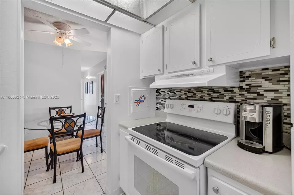 Kitchen - 16901 NE 13th Ave #210, Miami, FL 33162 photo 3 of 4