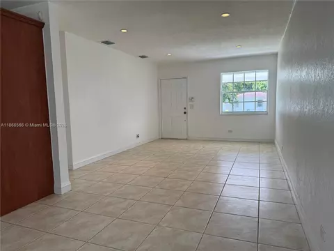 Living - 105 E 55th St, Hialeah, FL 33013 photo 2 of 3