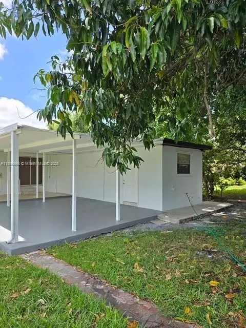 Exterior - 105 E 55th St, Hialeah, FL 33013 photo 3 of 8