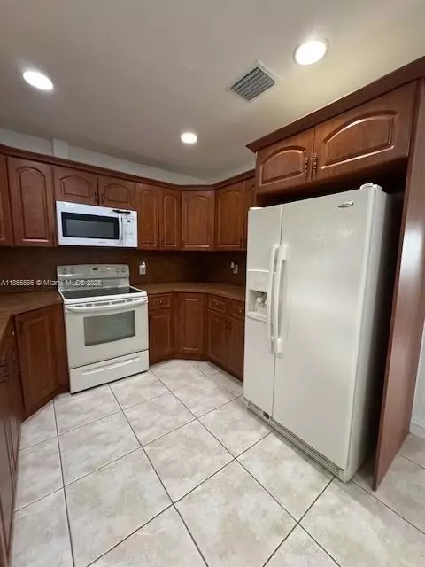 Kitchen - 105 E 55th St, Hialeah, FL 33013 photo 2 of 2