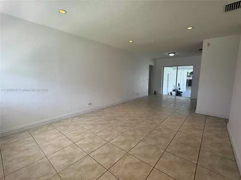 Living - 105 E 55th St, Hialeah, FL 33013 photo 1 of 3