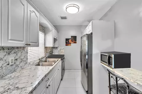 Kitchen - 690 SE 8th St, Hialeah, FL 33010 photo 3 of 3