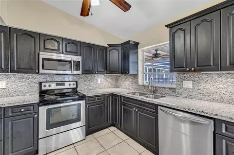 Kitchen - 650 NE 178 St, Miami, FL 33162 photo 3 of 4