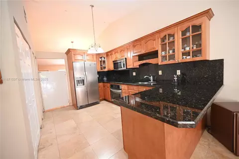 Kitchen - 5870 W 20th Ln, Hialeah, FL 33016 photo 3 of 3