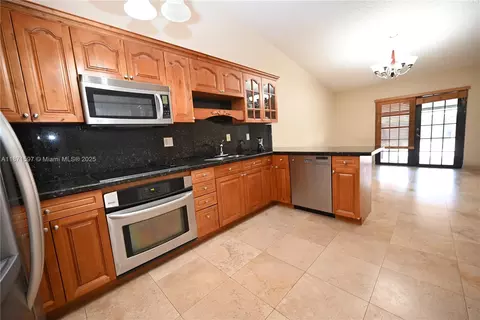 Kitchen - 5870 W 20th Ln, Hialeah, FL 33016 photo 1 of 3