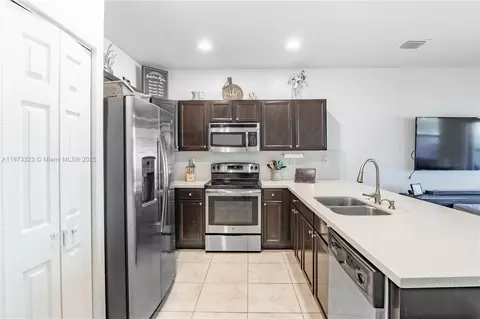 Kitchen - 8889 W 35th Ln, Hialeah, FL 33018 photo 1 of 3