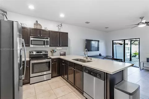 Kitchen - 8889 W 35th Ln, Hialeah, FL 33018 photo 2 of 3