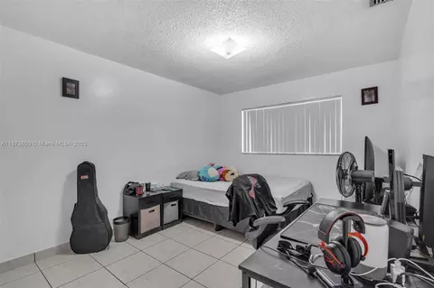 Bedroom - 4776 E 10th Ave, Hialeah, FL 33013 photo 2 of 7