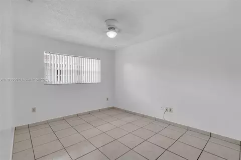 Bedroom - 4776 E 10th Ave, Hialeah, FL 33013 photo 4 of 7