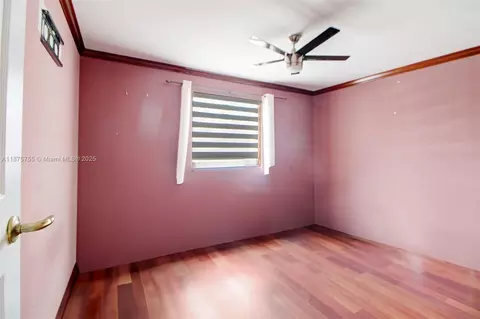 Bedroom - 8467 NW 201st Ter, Hialeah, FL 33015 photo 1 of 5