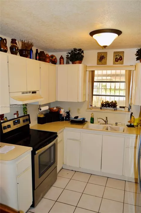 Kitchen - 601 E 33rd St, Hialeah, FL 33013 photo 1 of 2