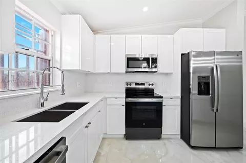 Kitchen - 3203 W 70th Ter, Hialeah, FL 33018 photo 2 of 2