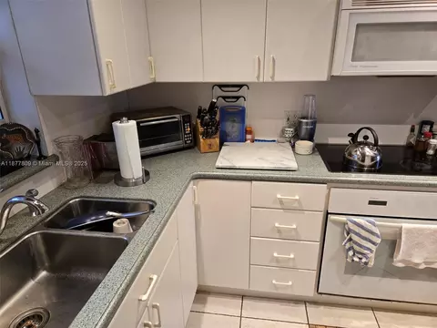 Kitchen - 7322 Stardust Dr, Hialeah, FL 33015 photo 1 of 2