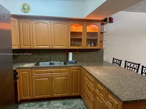 Kitchen - 7174 W 2nd Ln, Hialeah, FL 33014 photo 3 of 3