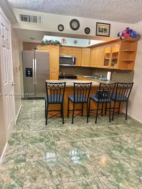 Kitchen - 7174 W 2nd Ln, Hialeah, FL 33014 photo 1 of 3