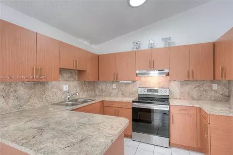 Kitchen - 2525 W 73rd Pl, Hialeah, FL 33016 photo 2 of 2