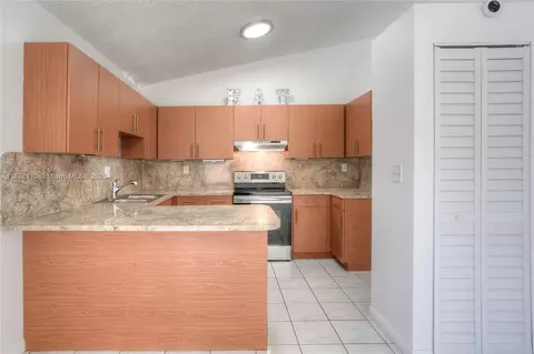Kitchen - 2525 W 73rd Pl, Hialeah, FL 33016 photo 1 of 2