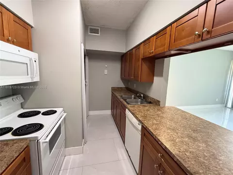 Kitchen - 18332 NW 68th Ave #A, Hialeah, FL 33015 photo 3 of 5