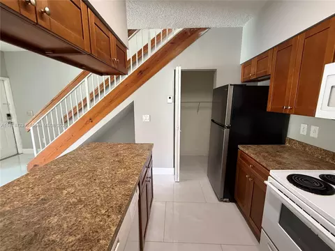 Kitchen - 18332 NW 68th Ave #A, Hialeah, FL 33015 photo 5 of 5