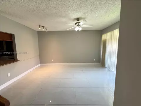 Living - 18332 NW 68th Ave #A, Hialeah, FL 33015 photo 2 of 5