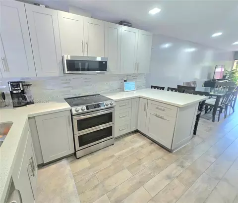 Kitchen - 19710 Cypress Ct, Hialeah, FL 33015 photo 3 of 4