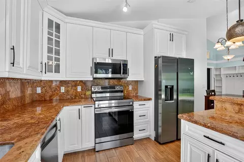 Kitchen - 10094 Encore Path, Boca Raton, FL 33428 photo 2 of 2