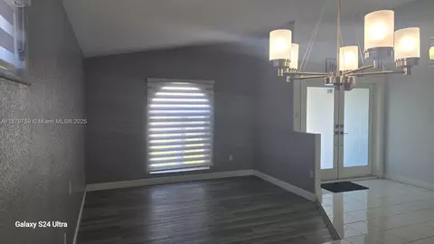 Living - 3240 W 76th Pl, Hialeah, FL 33018 photo 1 of 2