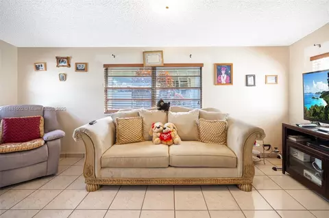 Living - 648 E 56th St, Hialeah, FL 33013 photo 3 of 3