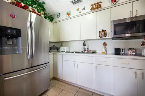 Kitchen - 648 E 56th St, Hialeah, FL 33013 photo 1 of 2