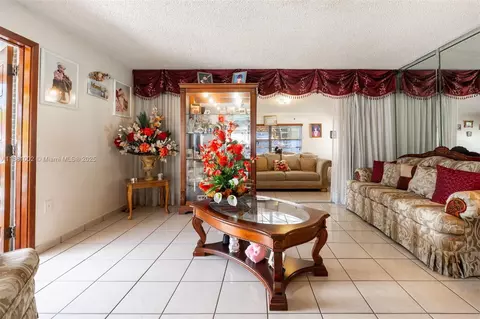 Living - 648 E 56th St, Hialeah, FL 33013 photo 2 of 3