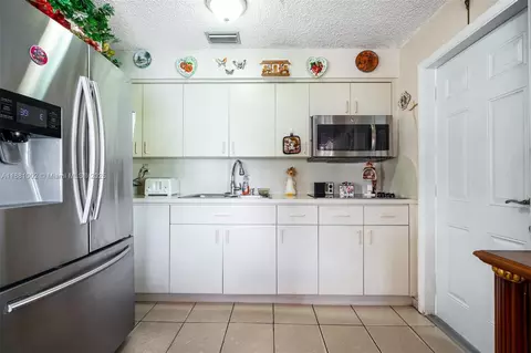 Kitchen - 648 E 56th St, Hialeah, FL 33013 photo 2 of 2