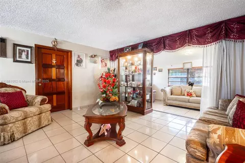 Living - 648 E 56th St, Hialeah, FL 33013 photo 1 of 3