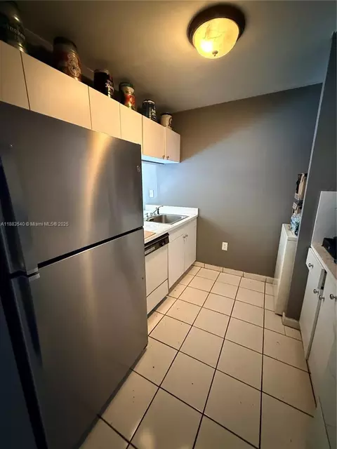 Kitchen - 440 E 23rd St #1316, Hialeah, FL 33013 photo 3 of 4