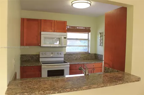 Kitchen - 971 E 18th St, Hialeah, FL 33013 photo 2 of 7
