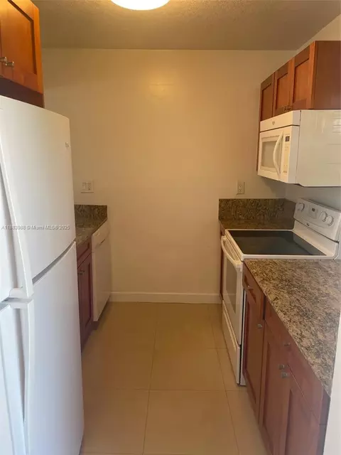 Kitchen - 971 E 18th St, Hialeah, FL 33013 photo 3 of 7
